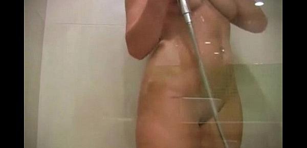  Long haired busty NRI playing with shaved pussy in shower